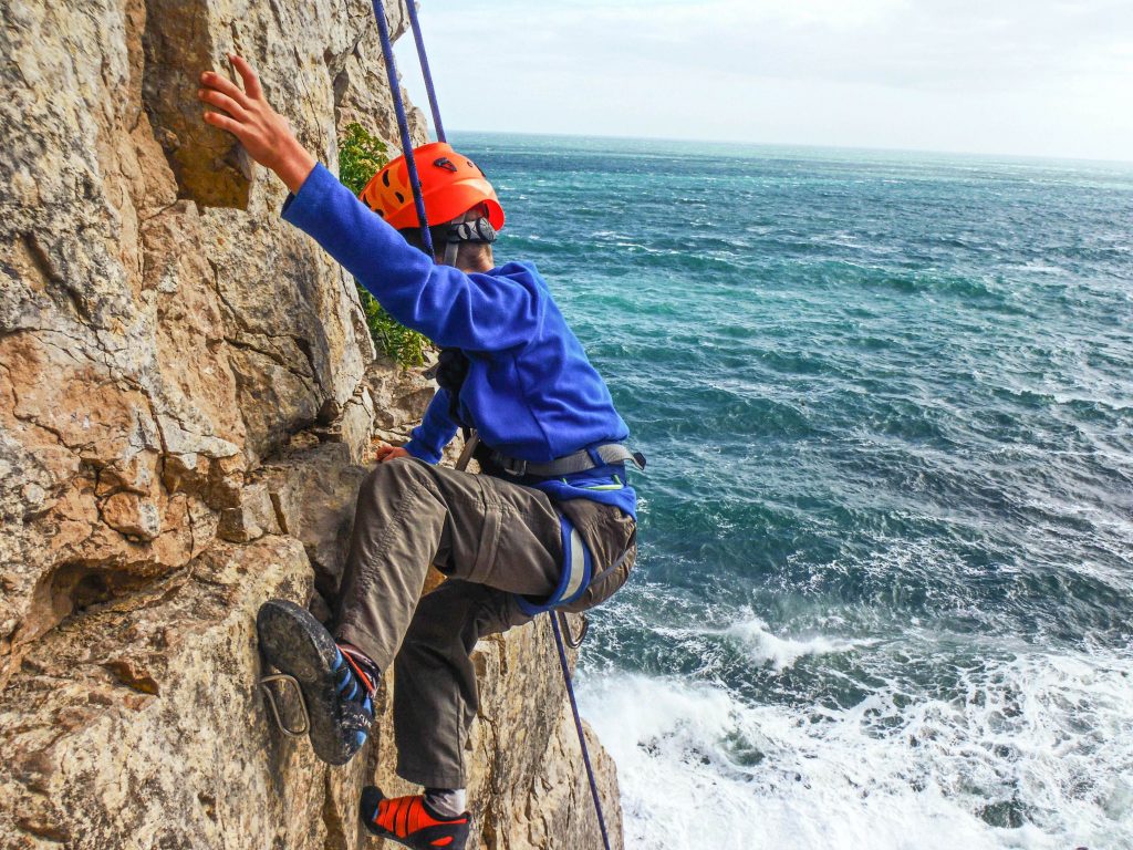 climbing cliff with sea views in dorset