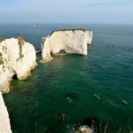Kayakers close to the base of Old Harry Rocks