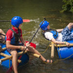 Falling from the raft on the lake