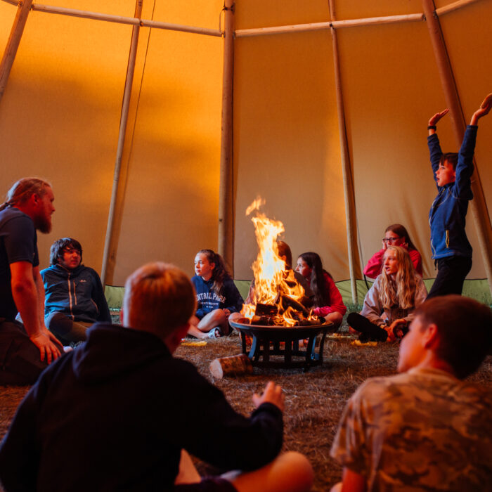 Tipi time around the fire pit