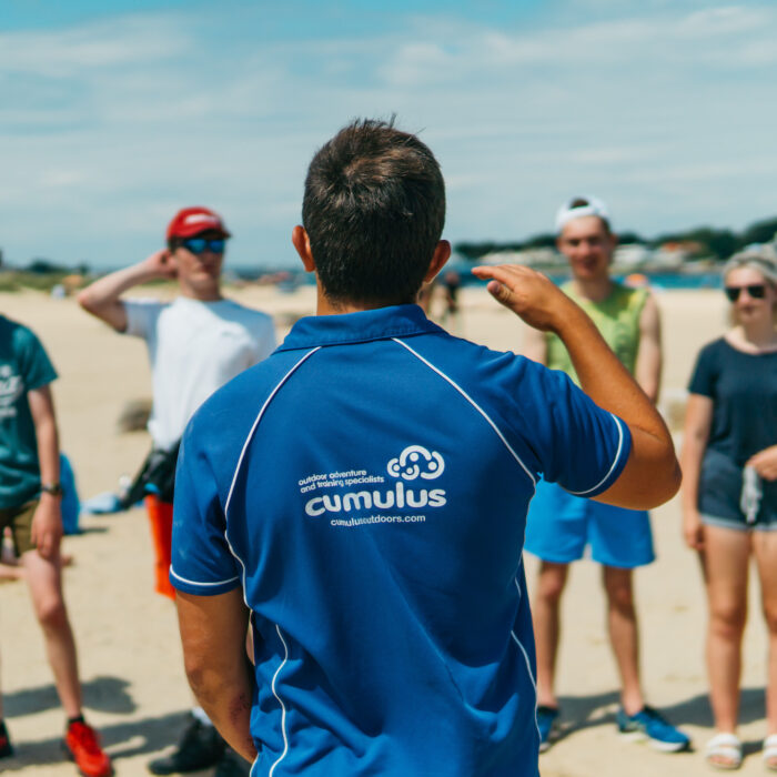 Cumulus leader instructing on beach safety