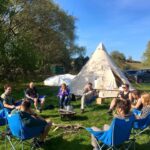 staff relaxing at the campsite