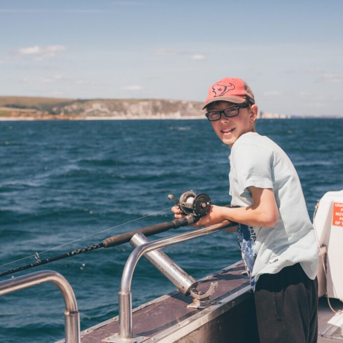 student mackerel fishing
