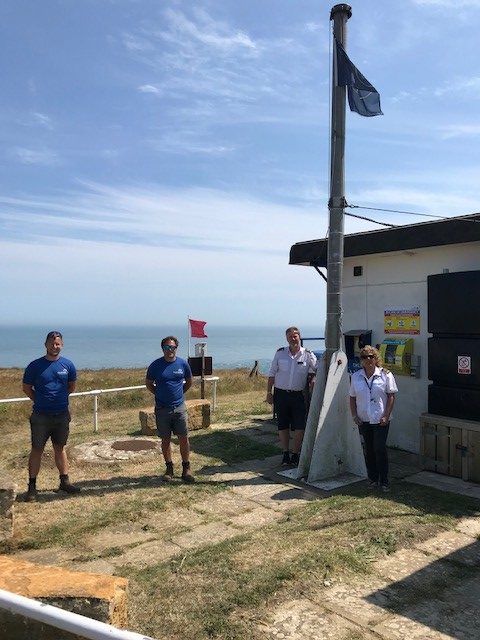 cumulus team with members of coast watch