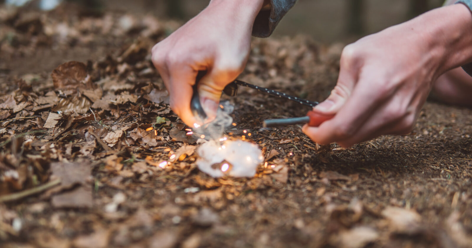 lighting a fire in a bushcraft session