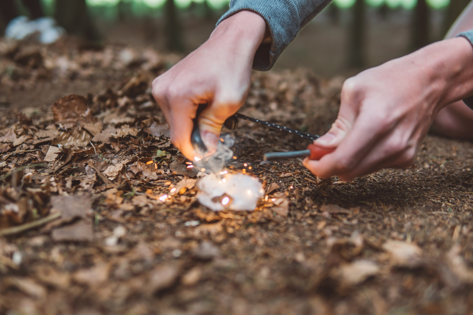 lighting a fire in a bushcraft session