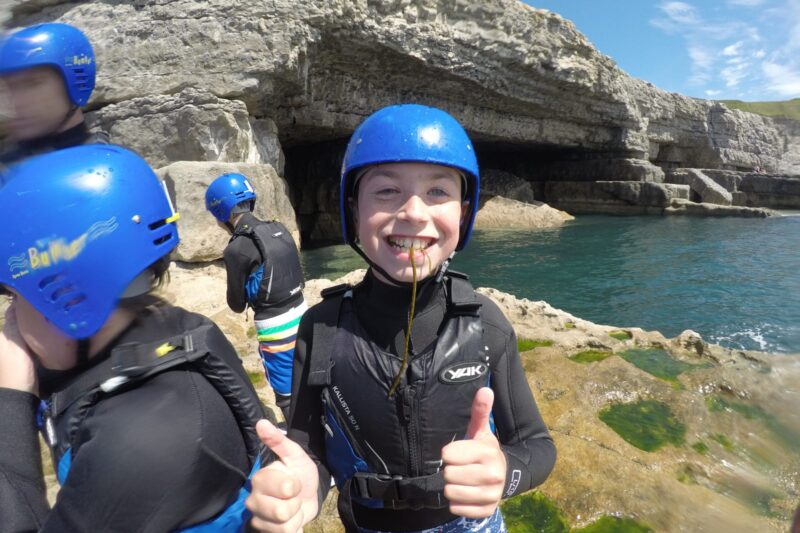 Children coasteering with Cumulus Outdoors Dorset