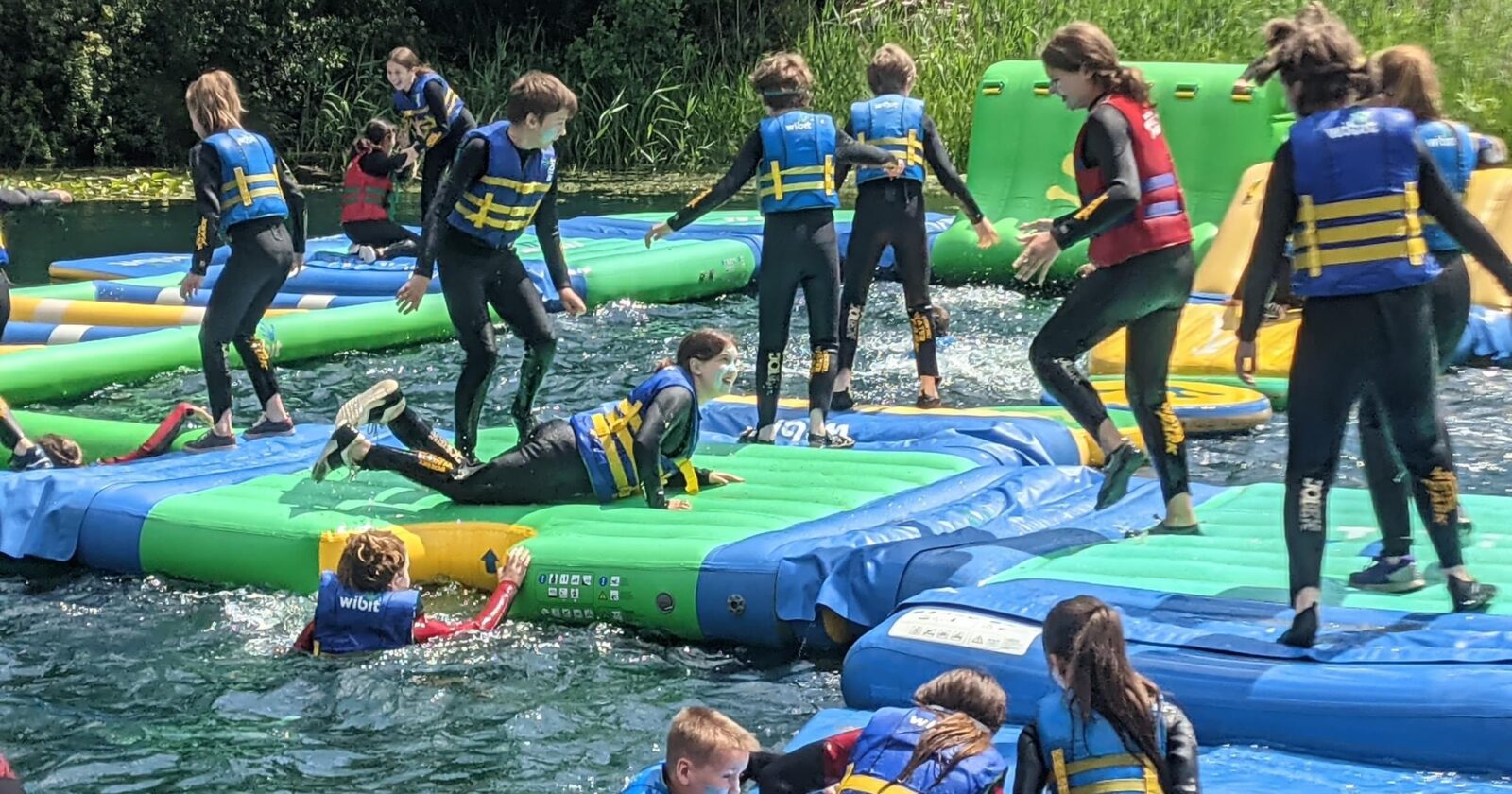 climbing on dorset water park inflatable equipment