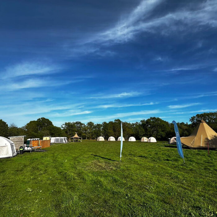 panoramic photo of tented village at cumulus outdoors