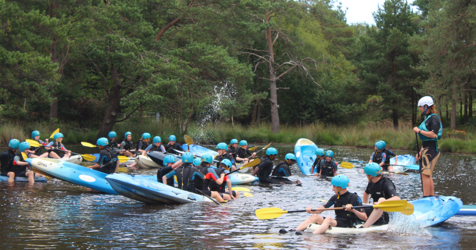 DofE Summer Gold Residential participants creating chaos on lake in Dorset